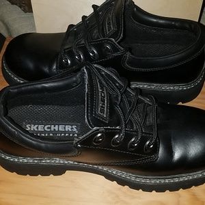 Skechers leather upper shoes.